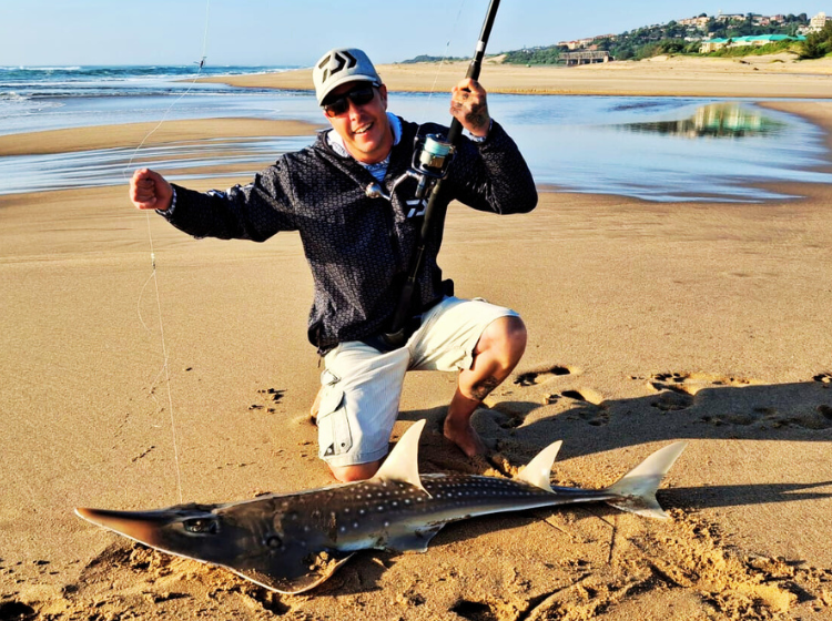 Craig Bodley with a Sand Shark caught at Illovo