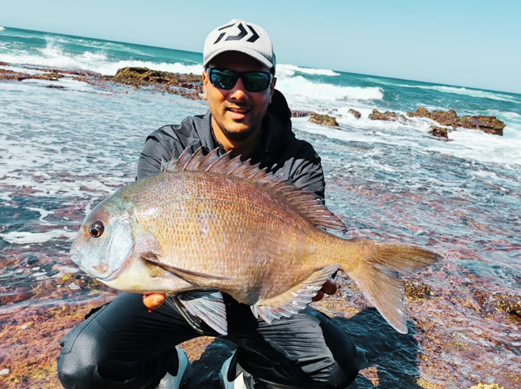 Dean Reddy with a massive Bronze Bream caught on the north coast
