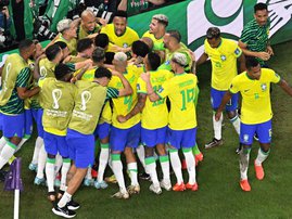 Brazil players celebrate against Switzerland at World Cup