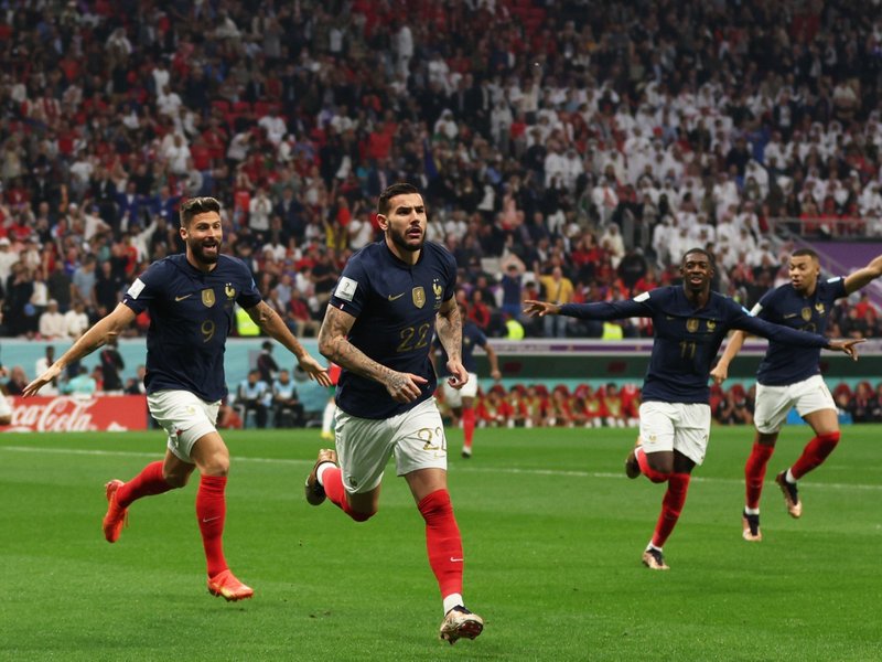 France's defender #22 Theo Hernandez celebrates scoring in the Qatar 2022 World Cup semi-final