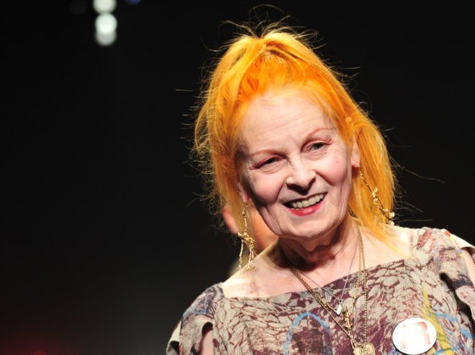 In this file photo taken on June 19, 2011 British designer Vivienne Westwood acknowledges the audience at the end of the Vivienne Westwood Spring-Summer 2012 Menswear collection during the Men's fashion week in Milan. British fashion designer Vivienne We