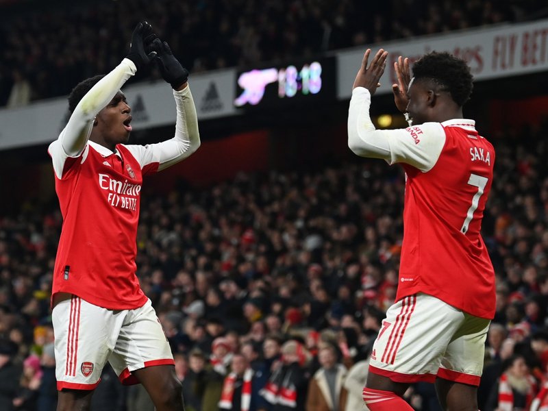 Arsenal's Eddie Nketiah (L) celebrates with Bukayo Saka