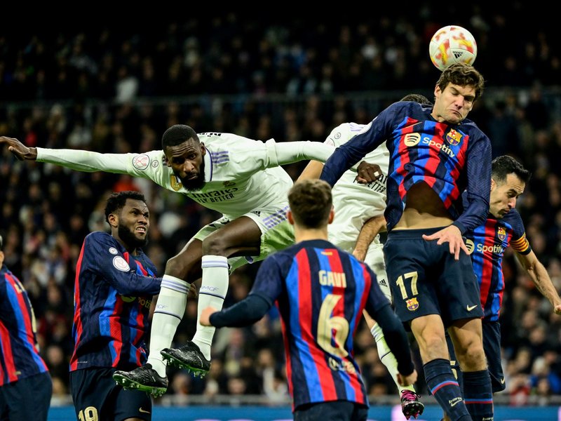 Real Madrid's Antonio Rudiger and Barcelona's Marcos Alonso