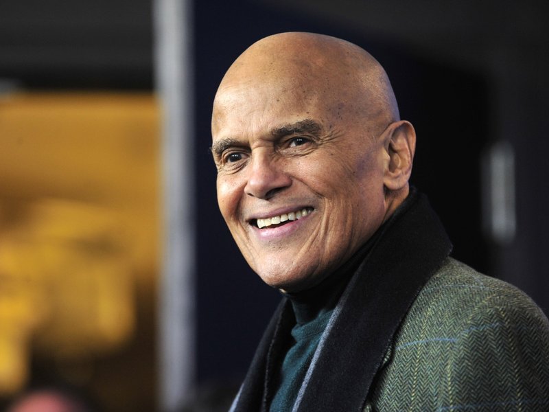 In this file photo taken on February 12, 2011 US singer Harry Belafonte poses during a photocall for photographers