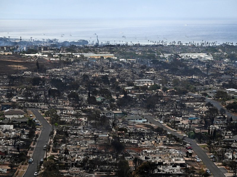 An aerial image taken on August 10, 2023 shows destroyed homes and buildings burned to the ground in Lahaina in the aftermath of wildfires in western Maui, Hawaii.