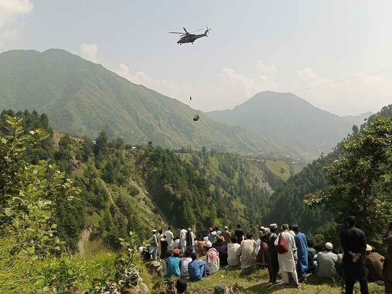 Children trapped in cable car dangling over Pakistan ravine