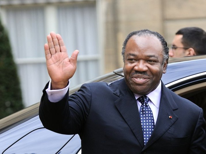 Gabonese President Ali Bongo Ondimba waves as he leaves the Elysee Palace after a meeting with French President Nicolas Sarkozy at the Elysee Palace in Paris, on February 21, 2011.