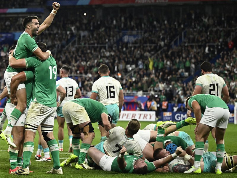 Ireland's scrum-half Conor Murray (up) celebrates the victory at the end of the France 2023 Rugby World Cup Pool B match between South Africa