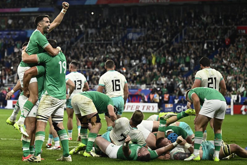 Ireland's scrum-half Conor Murray (up) celebrates the victory at the end of the France 2023 Rugby World Cup Pool B match between South Africa