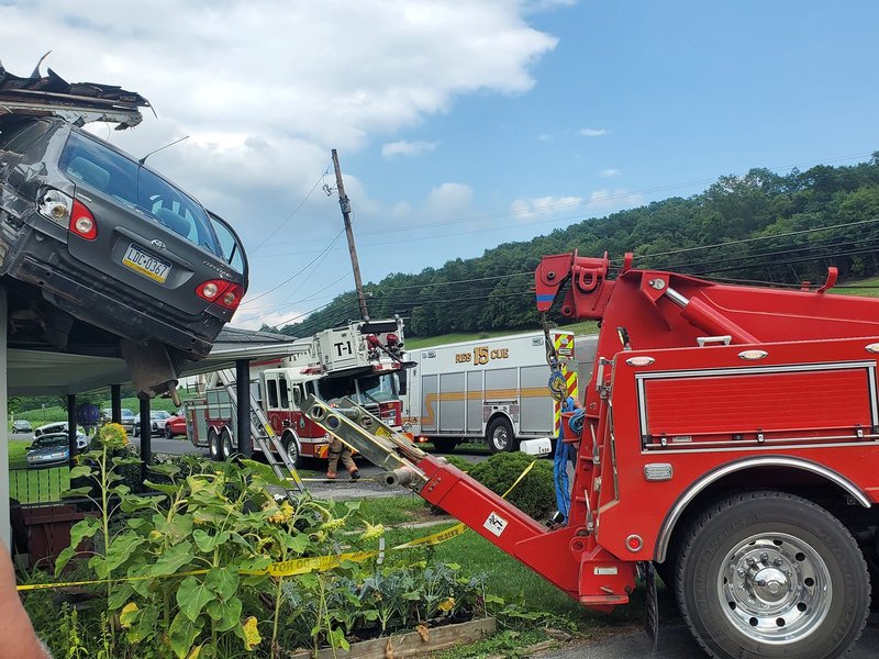 Car crashes into second floor of house