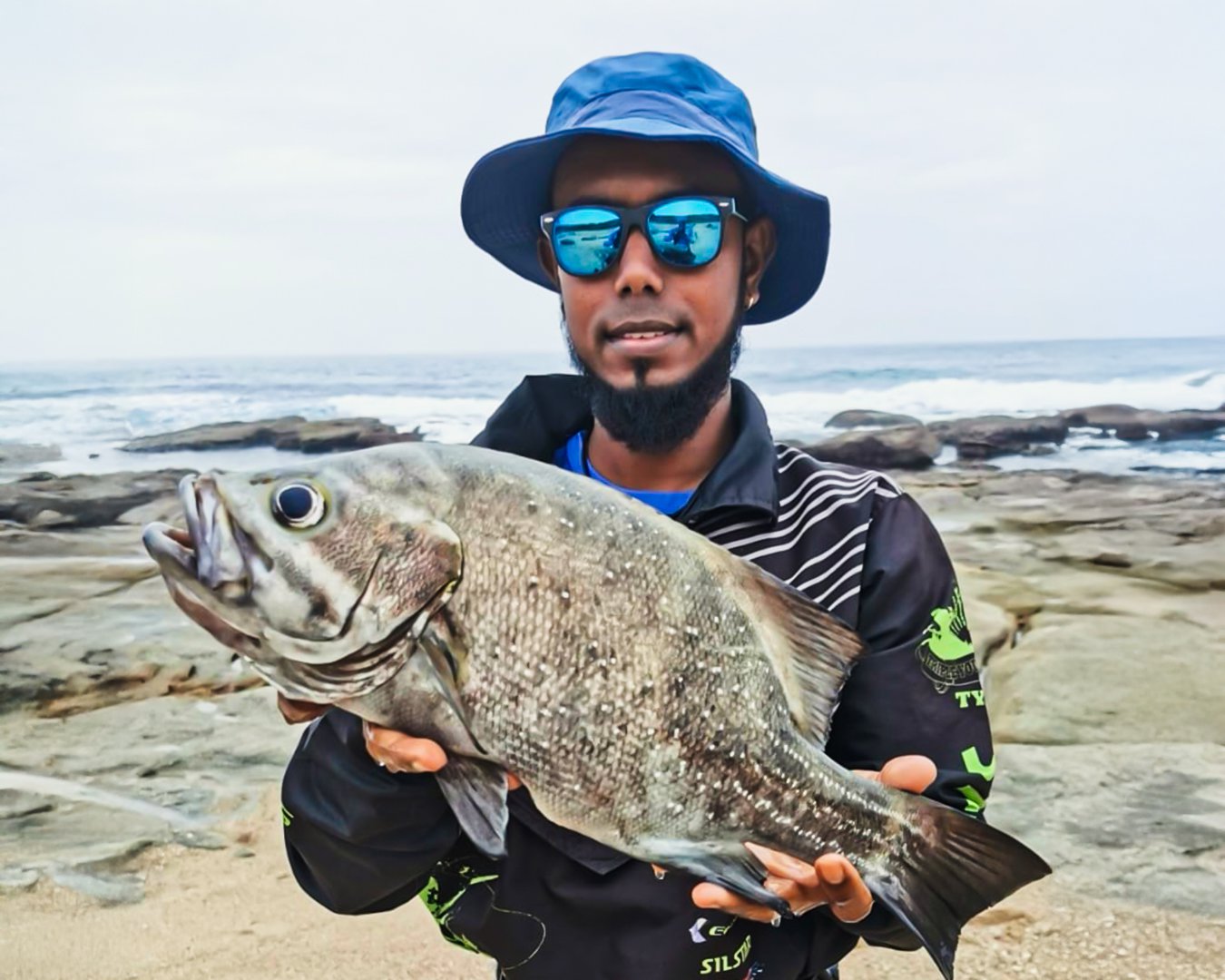 Kieron Naidoo with a stunning Cavebass rock fishing in the lower coast