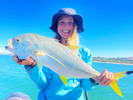 Michaela Daniel with a kingfish caught offshore while on holiday down the south coast