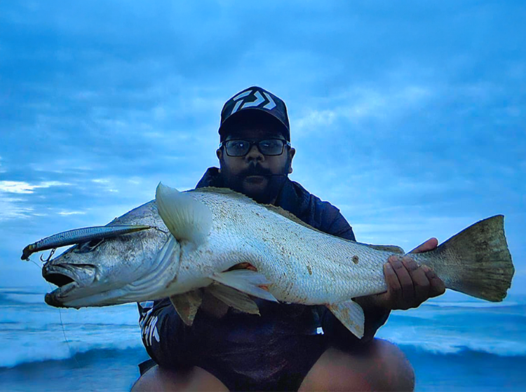 Tarquin Pillay with a Kob during an early morning spinning session off the north coast