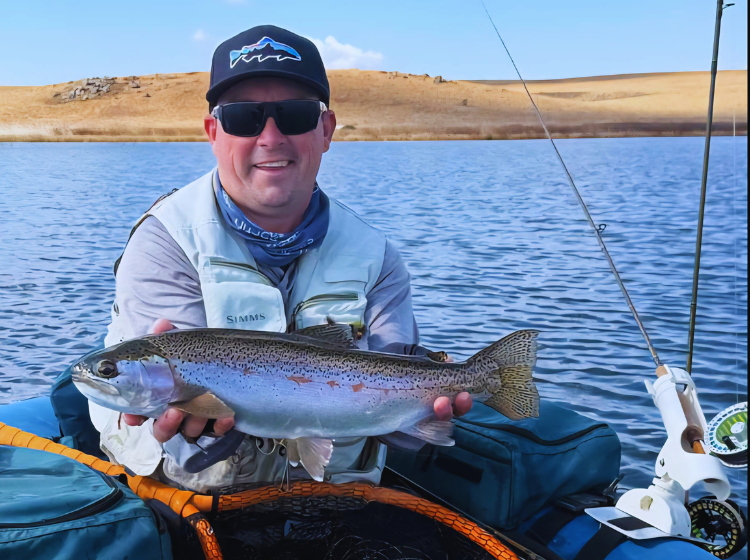 Tavis Cairns with a Rainbow Trout caught in the midlands