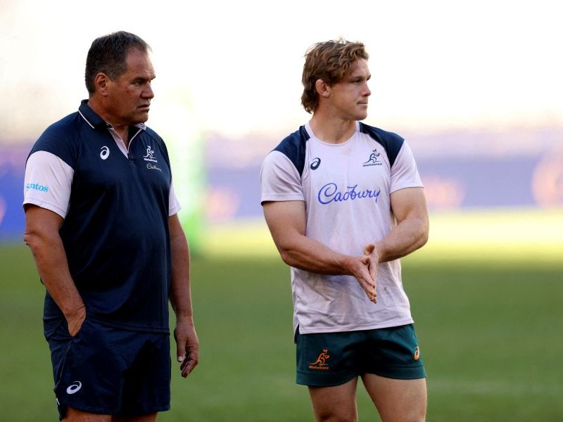 Australian captain Michael Hooper (R) and the coach Dave Rennie look on during the captains run in Perth on July 1, 2022