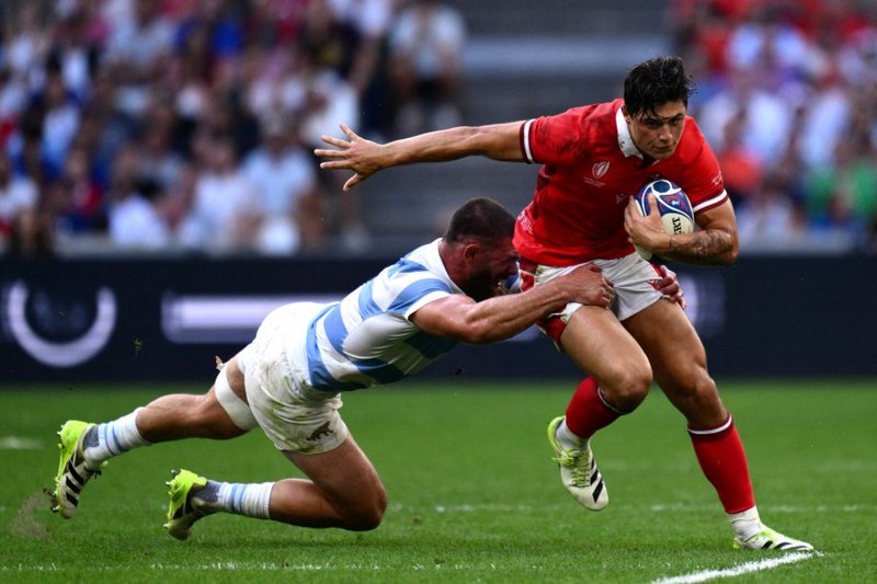 Louis Rees-Zammit playing for Wales in the Rugby World Cup in 2023