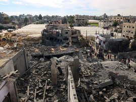 Palestinians inspect the damage in Rafah on the southern Gaza Strip