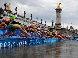Women triathletes dive into River Seine at Paris Olympics