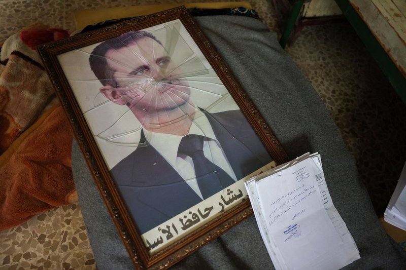 Rebels declare end of Assad rule in Syria