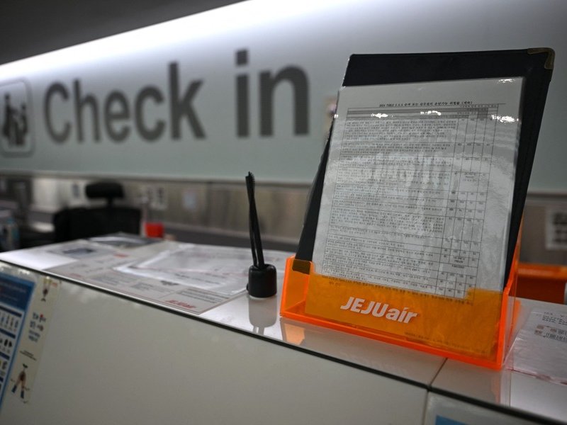 A check-in desk of Jeju Air is seen at Muan International Airport in Muan, some 288 kilometres southwest of Seoul on December 30, 2024.