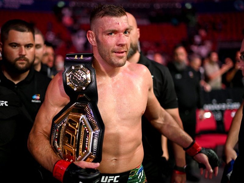 South Africa's Dricus du Plessis celebrates his victory over Sean Strickland of the US after their men's middleweight division event of the Ultimate Fighting Championship (UFC)