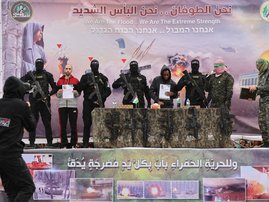 Hamas frees dazed hostages in staged Gaza ceremony