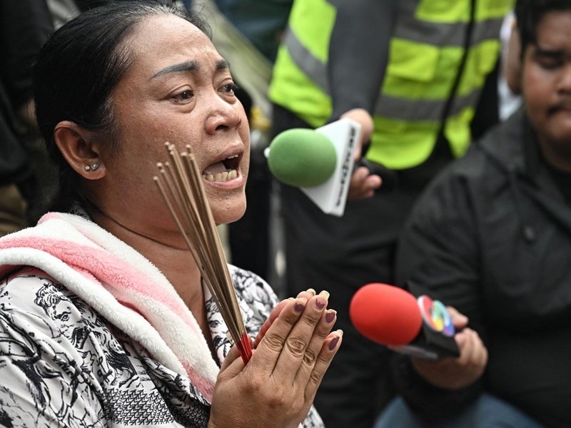 Tears, prayers in search for monks trapped by Myanmar quake