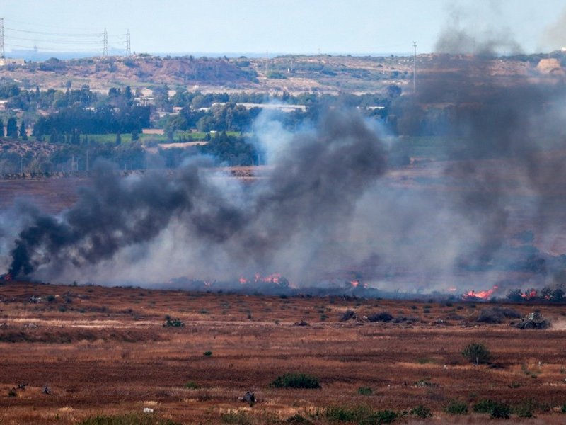 Israels southern border with the Gaza Strip shows buring fields after Israeli operations