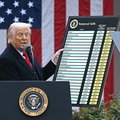 US President Donald Trump holds a chart as he delivers remarks on reciprocal tariffs