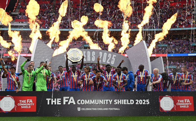 Crystal Palace's players celebrate with the trophy after Palace win the English FA Community Shield football match between Crystal Palace and Liverpool at Wembley Stadium