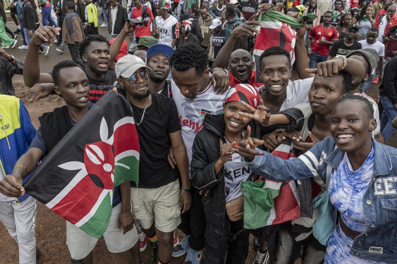 Supporters of Kenya cheer for their team following their victory against Zambia during the African Nations Championship