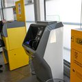 A woman posts mail at the Lunel post office south of France