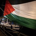 A giant Palestinian flag is deployed where four boats will leave to Gaza joining the “Global Sumud Flotilla”