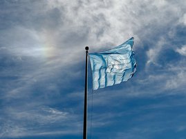 The flag of the United Nations flies outside of UN headquarters in New York
