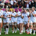 England players celebrate after the Women’s Rugby World Cup semi-final between France and England
