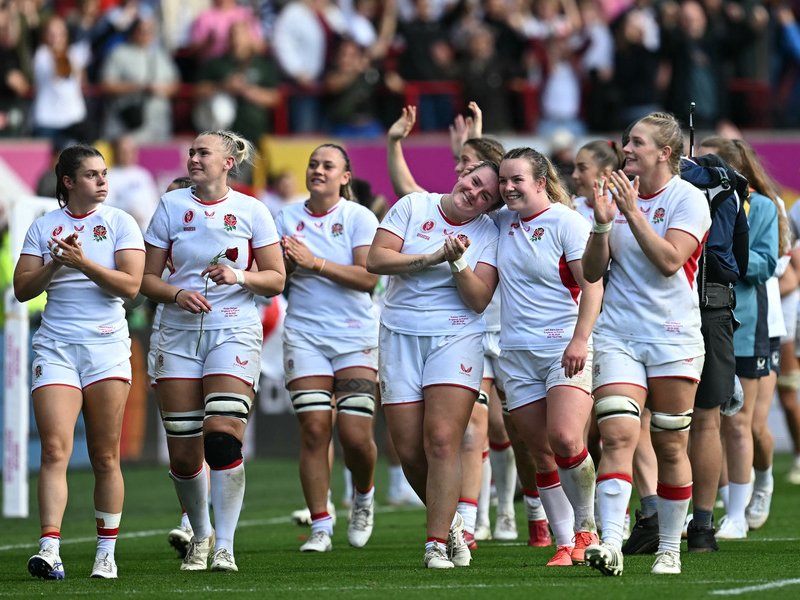 England players celebrate after the Women’s Rugby World Cup semi-final between France and England