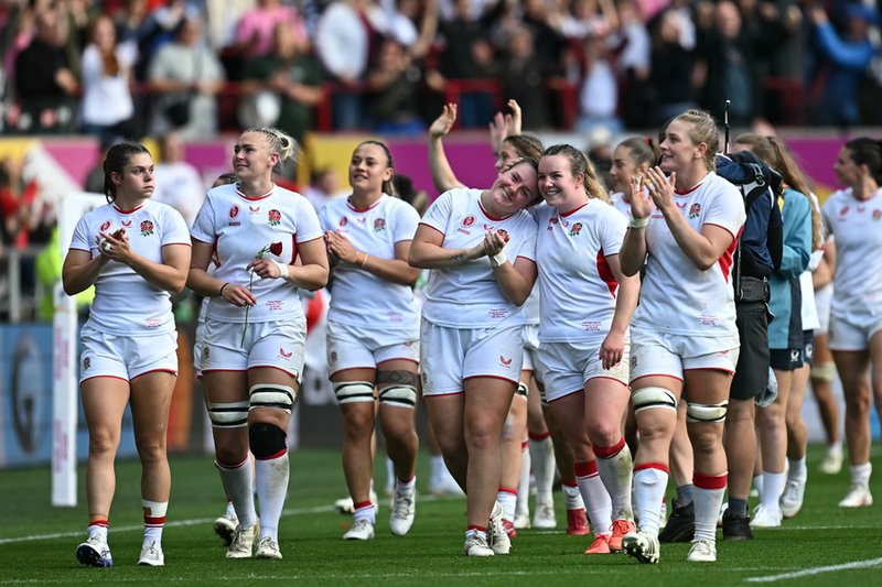 England players celebrate after the Women’s Rugby World Cup semi-final between France and England