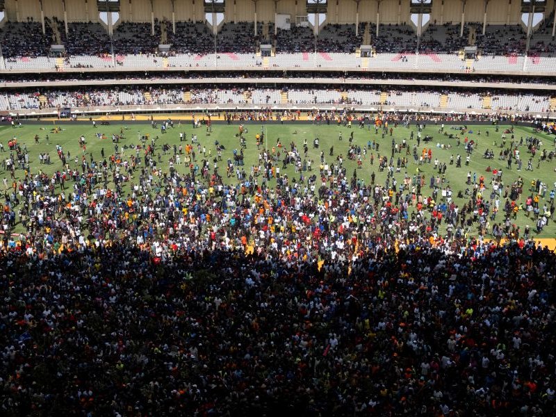 Supporters and mourners of Kenyan opposition leader Raila Odinga gather ahead of the public viewing of Odinga's coffin at the Kasarani Stadium in Nairobi