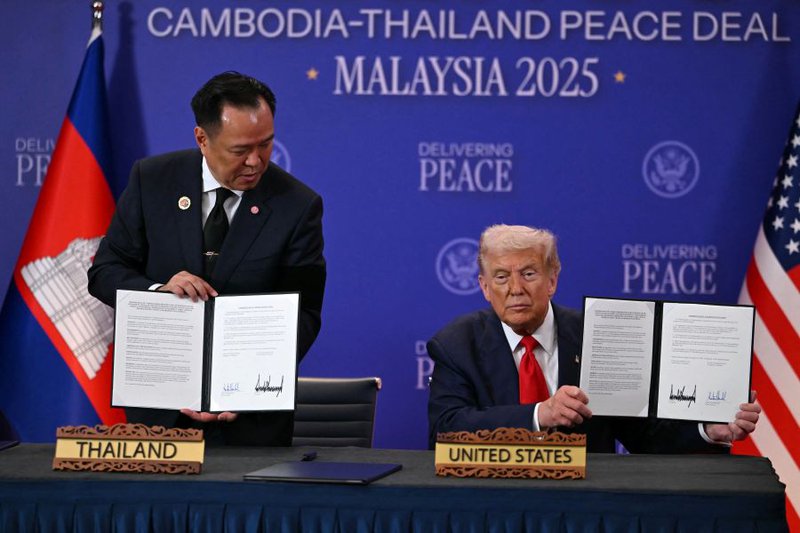 Trump co- signing the Combodian Thailand ceasefire agreement
