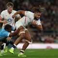 England's number 8 Chandler Cunningham-South is tackled by Fiji's hooker Tevita Ikanivere during the Autumn Nations Series international rugby union match between England and Fiji