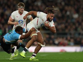 England's number 8 Chandler Cunningham-South is tackled by Fiji's hooker Tevita Ikanivere during the Autumn Nations Series international rugby union match between England and Fiji