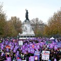 Protesters take part in a demonstration called by the French collective NousToutes (Us all) to protest against violence against women