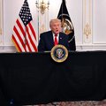 US President Donald Trump participates in a video call with military service members from his Mar-a-Lago residence in Palm Beach