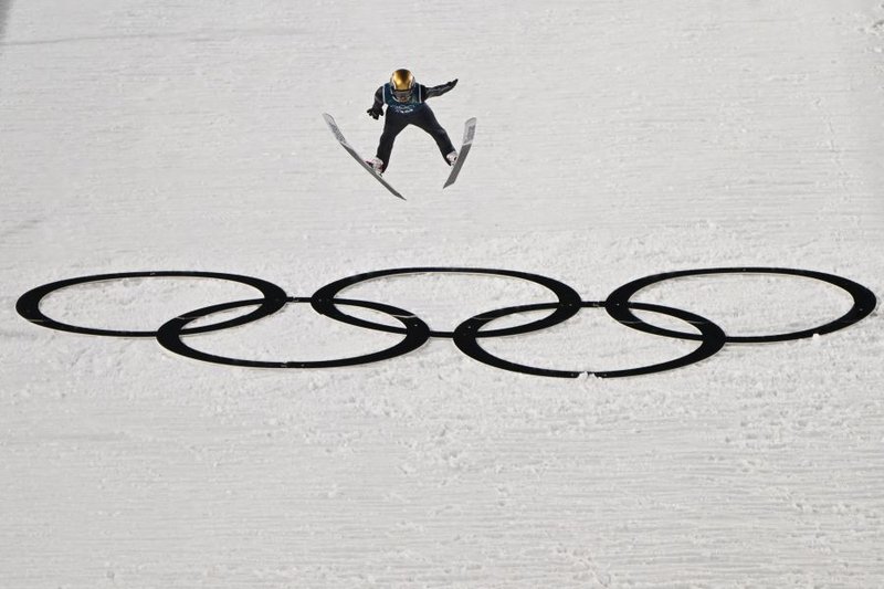 Bulgaria's Vladimir Zografski jumps during the men's ski jumping normal hill training of the Milano Cortina 2026 Winter Olympic Games