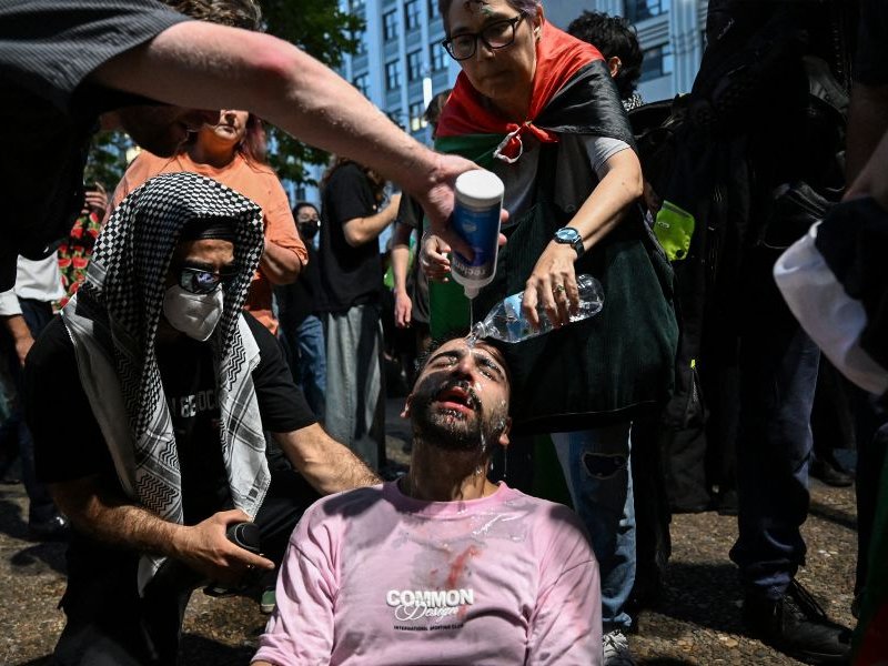 Protesters being sprayed with pepper spray
