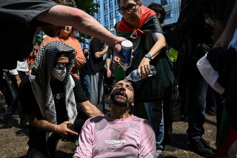 Protesters being sprayed with pepper spray