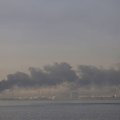 A plume of smoke rises from the port of Jebel Ali following a reported Iranian strike in Dubai