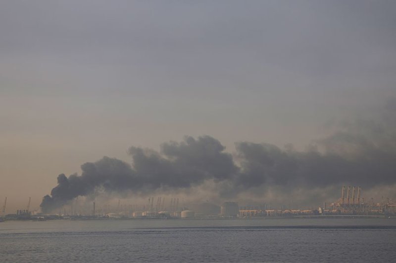 A plume of smoke rises from the port of Jebel Ali following a reported Iranian strike in Dubai