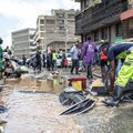 People salvage property from receding flood waters in downtown Nairobi