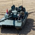 North Korean leader, daughter try out new tank